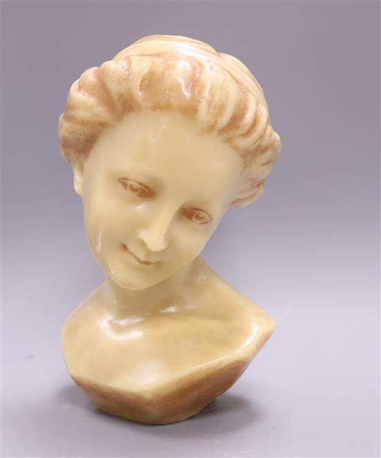 A wax bust of a girl H.30cm